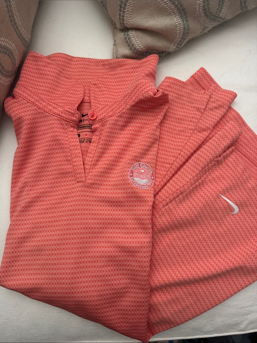 Nike women’s Coral/Peach Golf Shirt